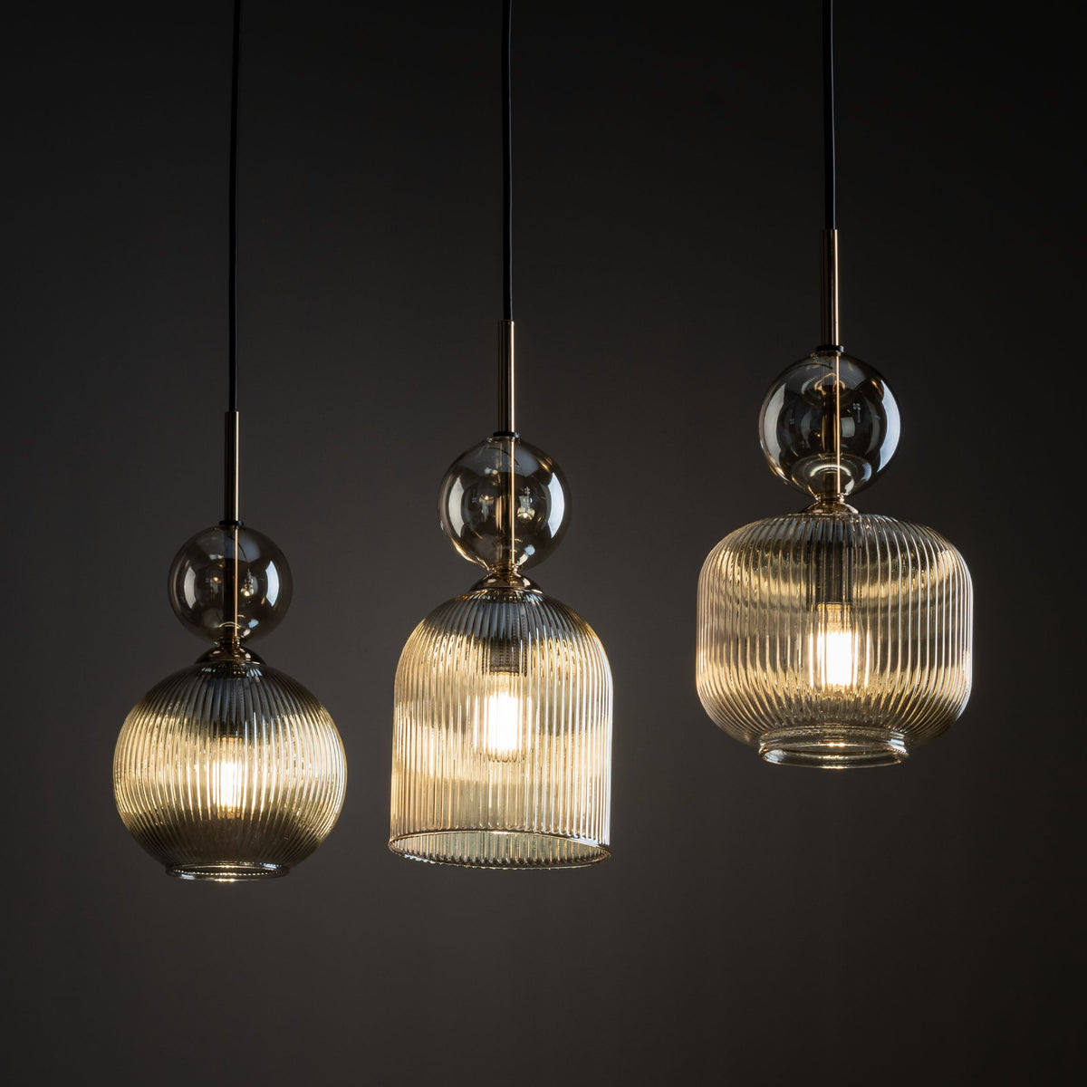 SOPHIA cognac linear pendant seen from below along the bar