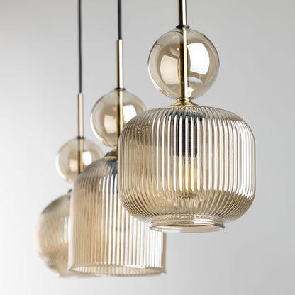 SOPHIA cognac ribbed glass linear pendant against a plain background