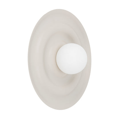 ONDA opal glass wall sconce by LumoCrafts, a 15.75 inch wave-formed steel disc in cashmere beige with an opal glass shade at its centre