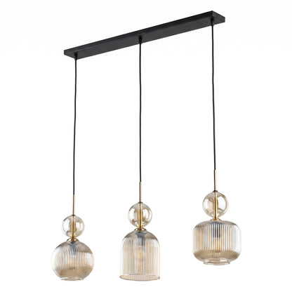 SOPHIA cognac ribbed glass 3-light linear pendant over a dining table