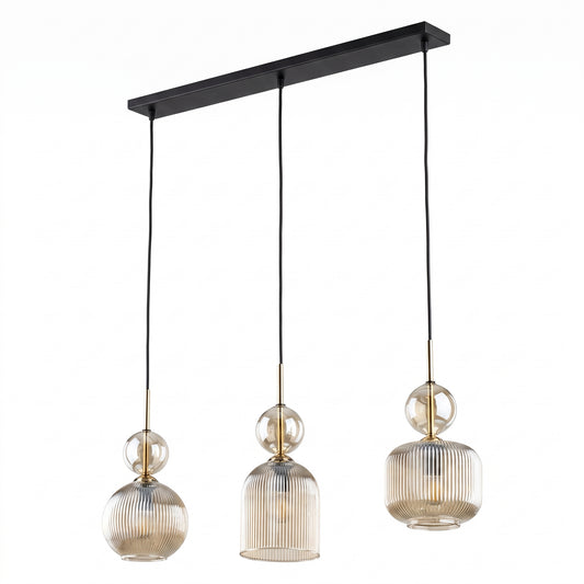 SOPHIA cognac ribbed glass 3-light linear pendant over a dining table